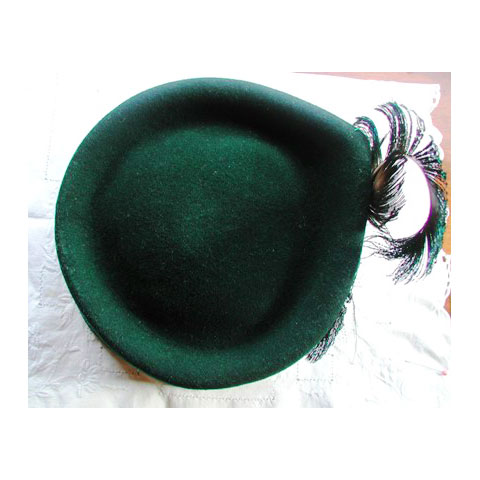 Green toque hat top